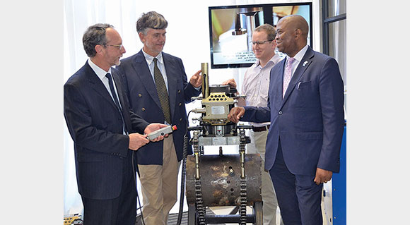 (Left to right): Prof. Danie Hattingh (NMMU), Phillip Doubell (Eskom), Dr Ian Wedderburn (eNtsa) and Dr Phil Mjwara (Department of Science and Technology) at the showcase event.